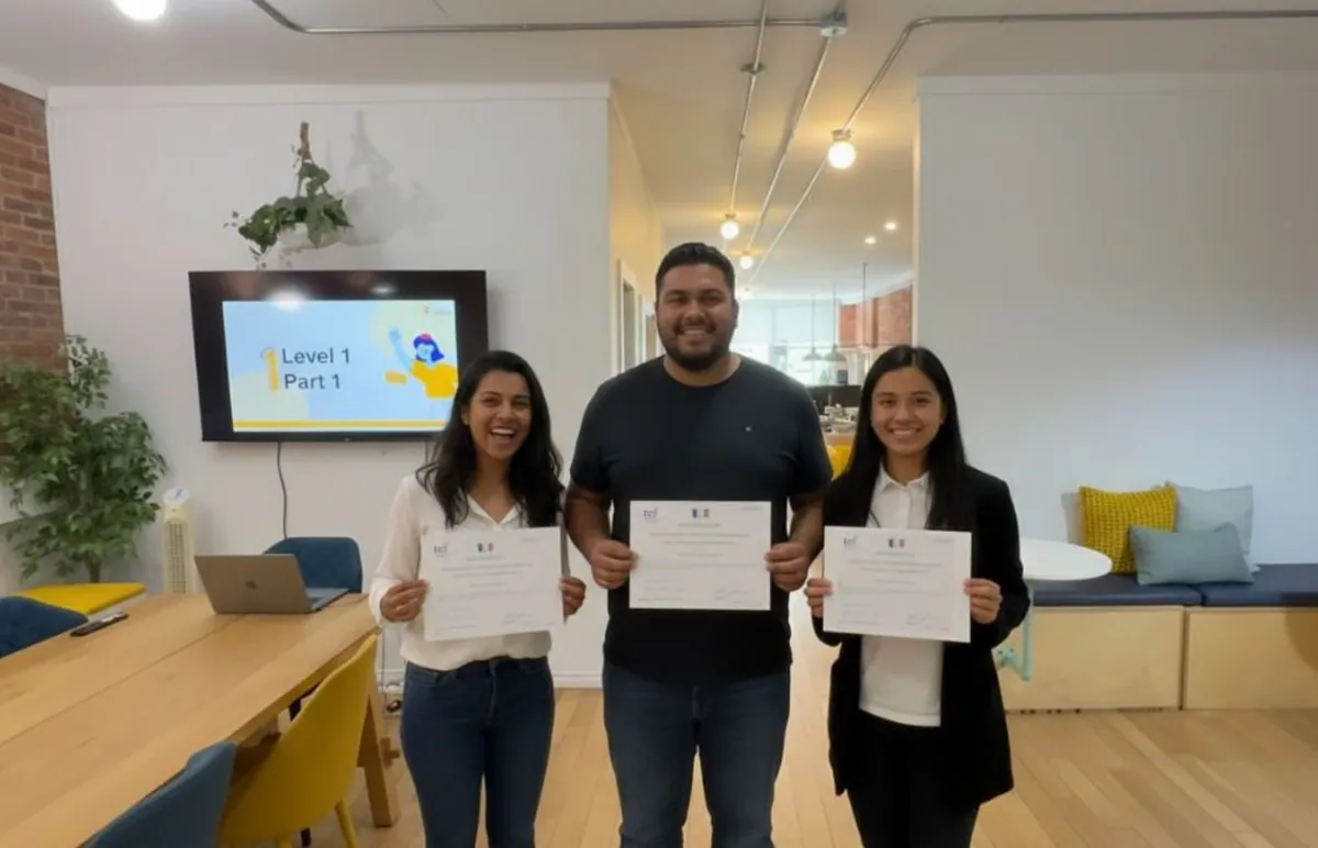 Learn French Canada students holding TEF certificates — successful French exam results for Canadian immigration