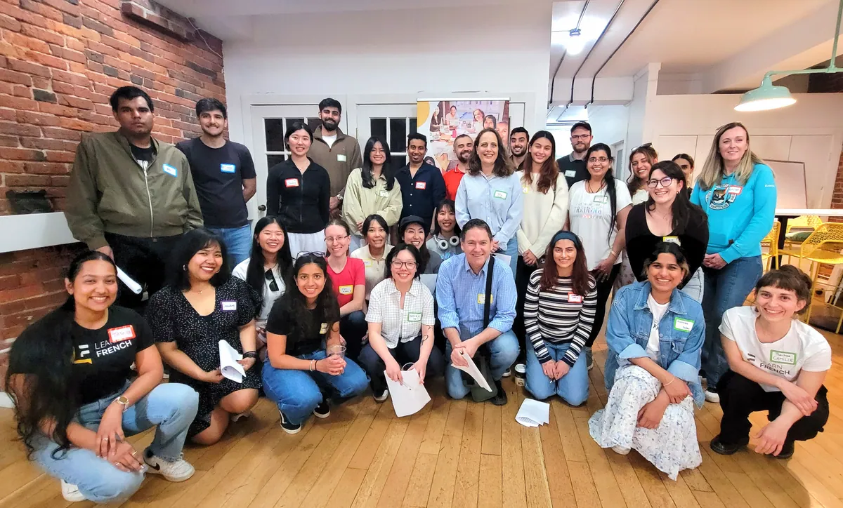Learn French Canada students together at a community event