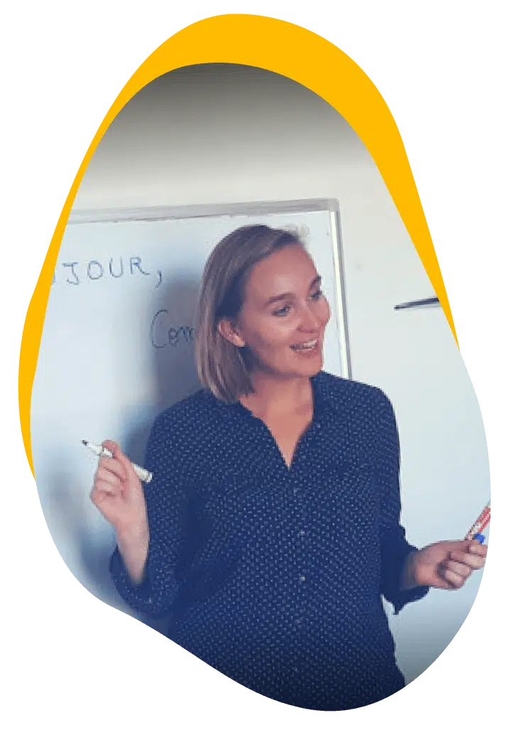Native French teacher at the whiteboard